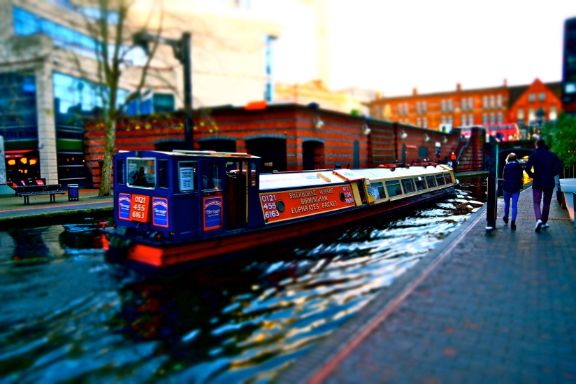 Walking along the canals of Brindley Place, Birmingham, UK
